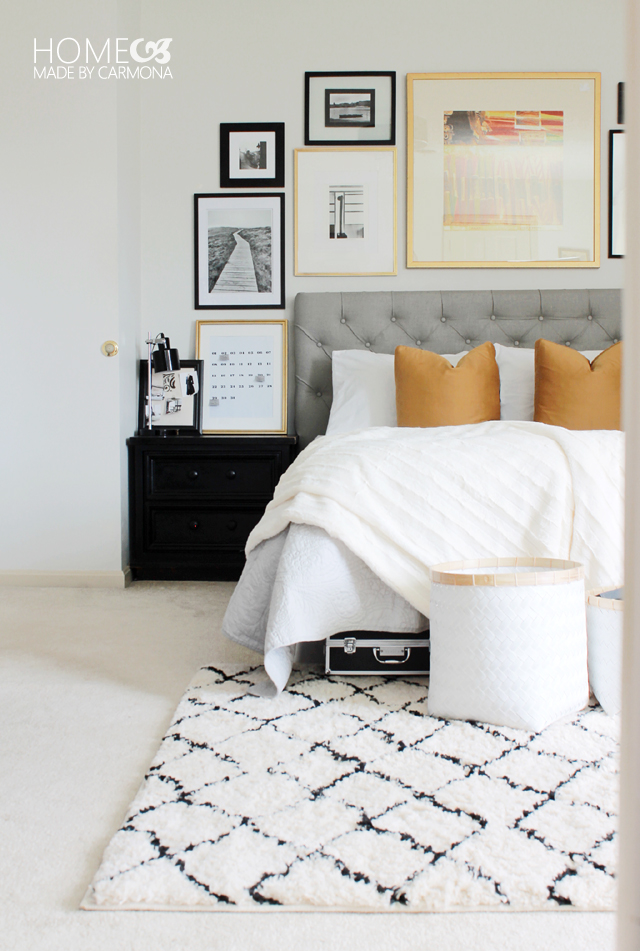 modern neutral gallery wall in bedroom