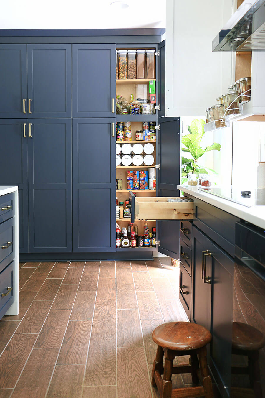 kitchen with organized spice drawer and cabinets