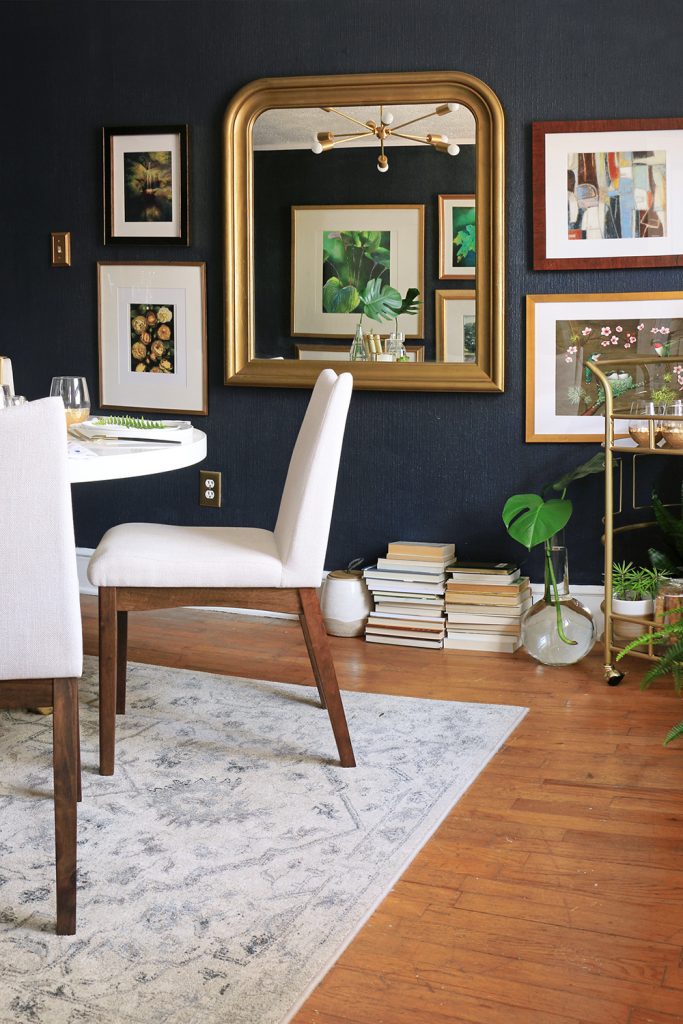 Dining room with large arched top mirror