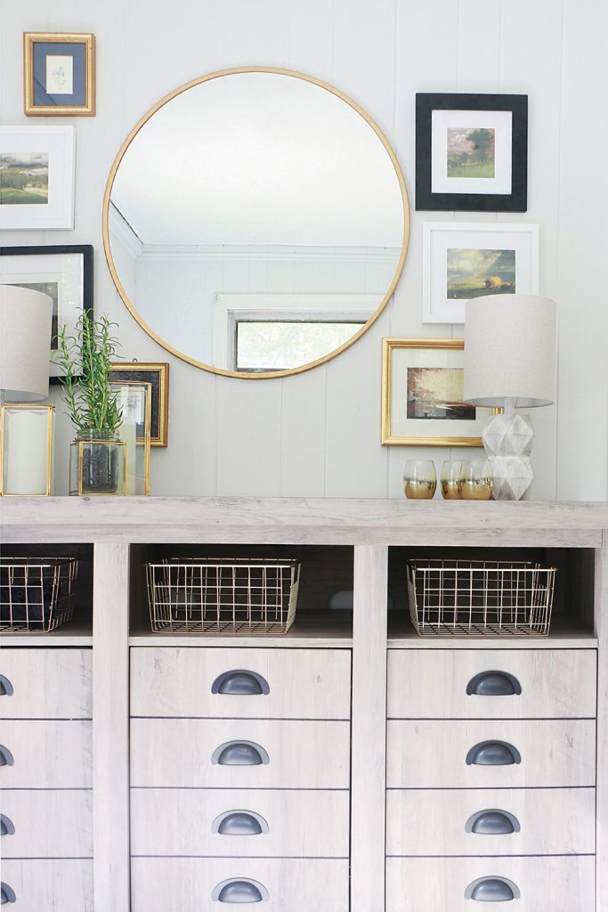 Mirror with art surrounding it