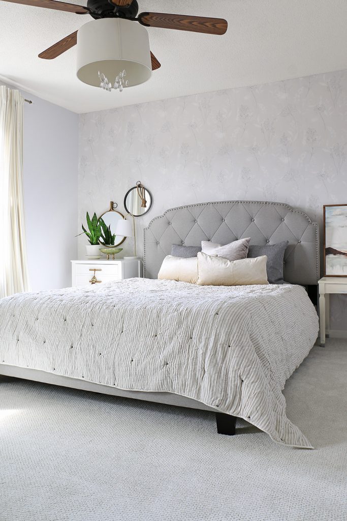 Styled bedroom with carpet