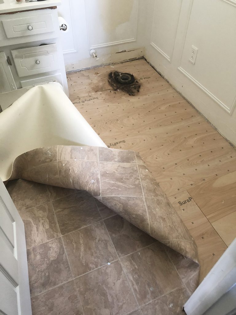 removing old vinyl laminate sheet flooring