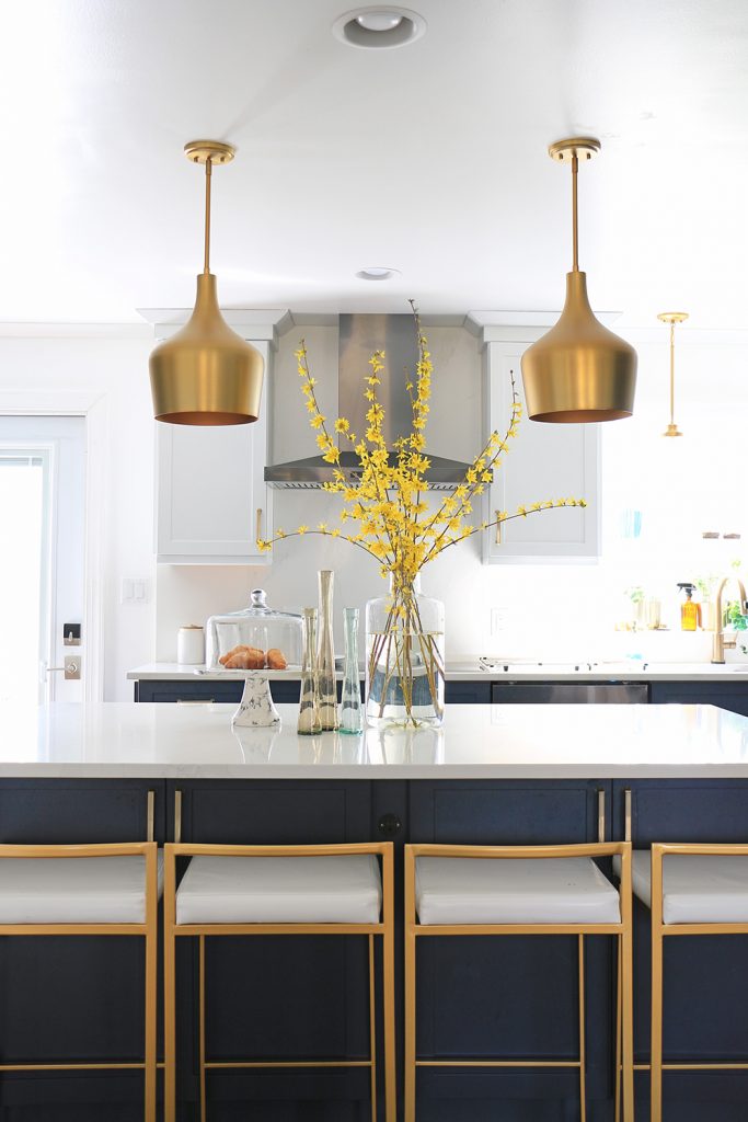 summer home tour with flowers in a kitchen