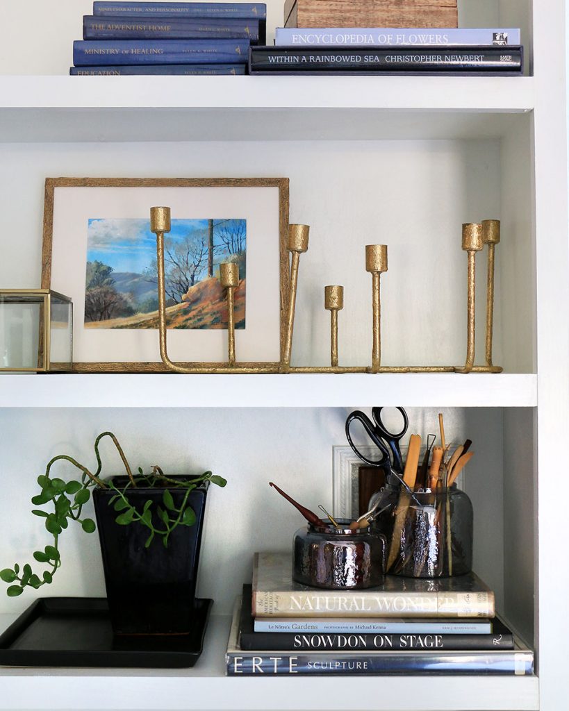 bookcase vignette with candelabra
