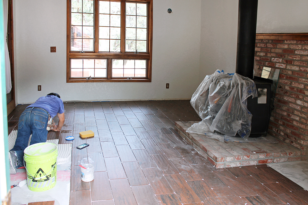 tile flooring being installed