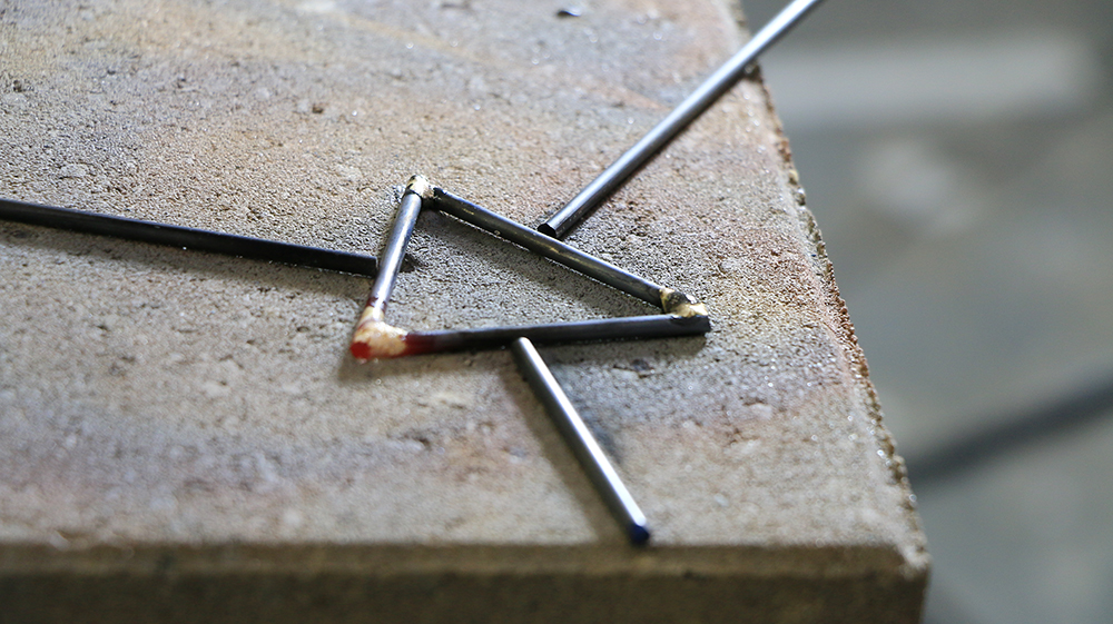 Brazed metal triangle