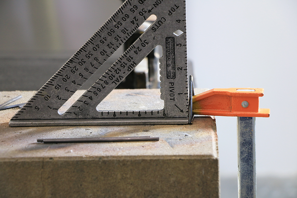 Metal clamp seed square