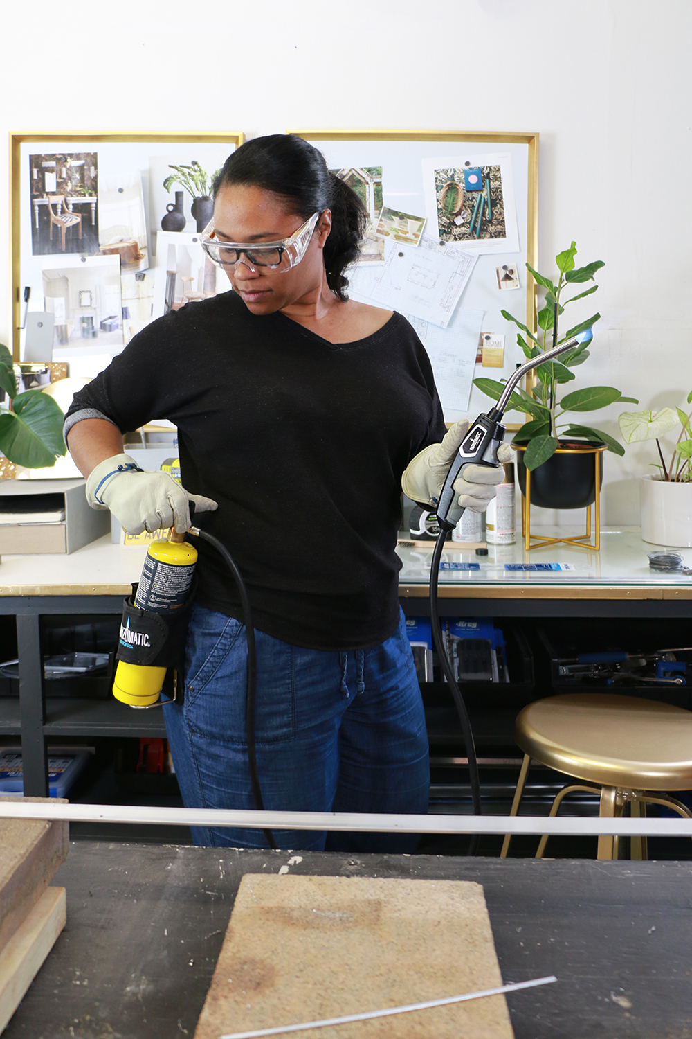 Metal worker Ursula Carmona using a Bernzomatic torch