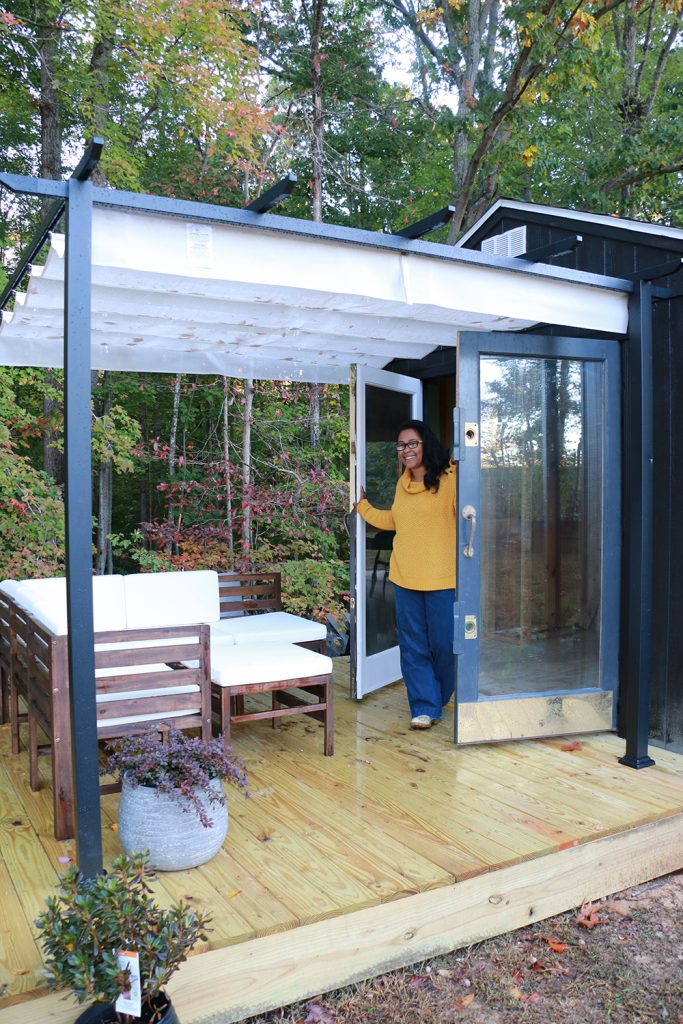 deck with french doors and pergola
