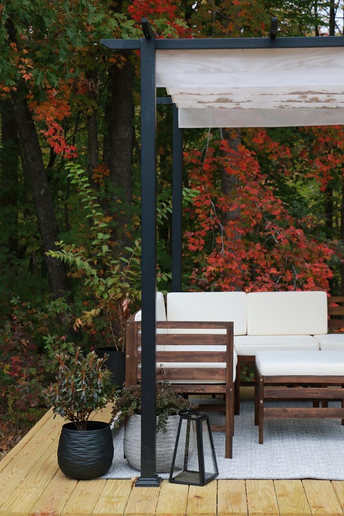 deck with pergola and outdoor furniture