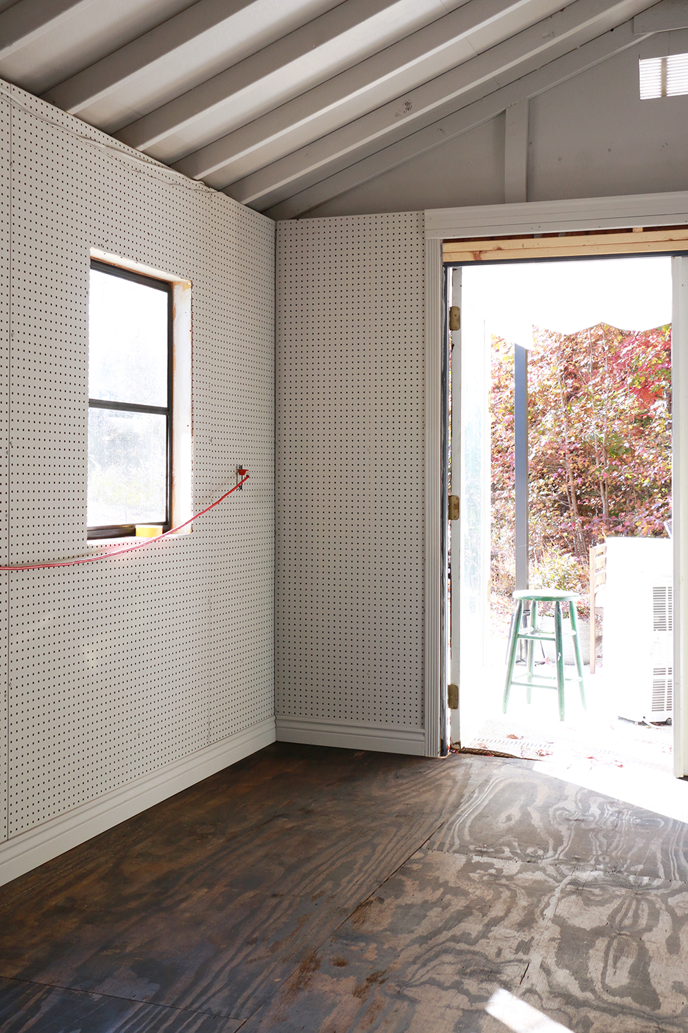 Pegboard walls in a shed